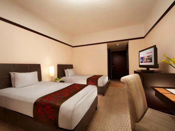 Millennium Hotel Sirih Jakarta : photo 6 de la chambre chambre lits jumeaux deluxe