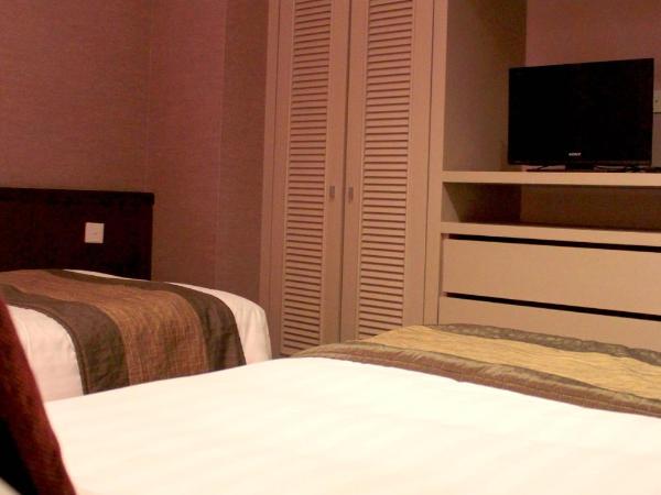 Pacific Regency Hotel Suites : photo 3 de la chambre suite familiale