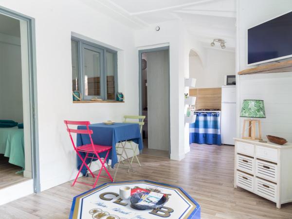 Maison d'hôtes L'îlot bambou : photo 2 de la chambre bungalow - vue sur jardin