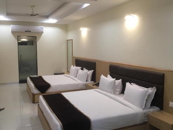 Hotel Aarunya Royale : photo 6 de la chambre chambre familiale