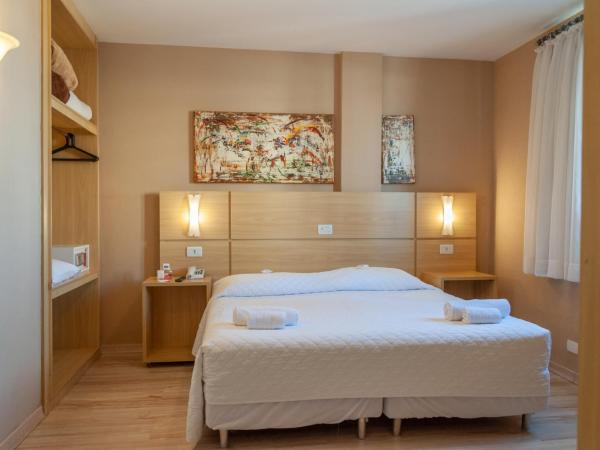 SJ Executive - San Juan Curitiba : photo 1 de la chambre suite