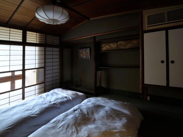 IZUYASU Traditional Kyoto Inn serving Kyoto cuisine : photo 1 de la chambre chambre lits jumeaux standard de style japonais - se