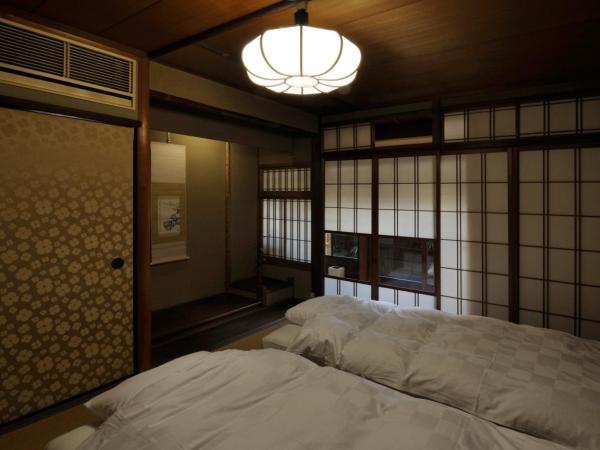 IZUYASU Traditional Kyoto Inn serving Kyoto cuisine : photo 1 de la chambre chambre lits jumeaux standard de style japonais - kou