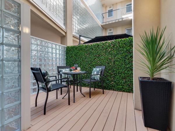 The Peninsula Riverside Serviced Apartments : photo 2 de la chambre classic one-bedroom triple bed suite