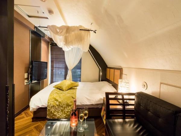 Hotel W-BAGUS -W GROUP HOTELS and RESORTS- : photo 1 de la chambre chambre lit queen-size - vue sur jardin