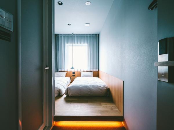 LANDABOUT TOKYO : photo 3 de la chambre petite chambre lits jumeaux.