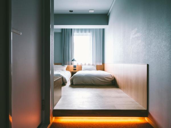 LANDABOUT TOKYO : photo 2 de la chambre chambre lits jumeaux standard