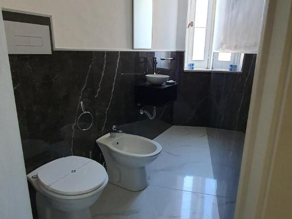 Cannatella's Mansion : photo 8 de la chambre suite lit king-size avec baignoire spa
