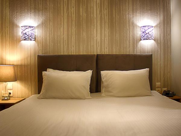 Athlos Hotel : photo 3 de la chambre grande chambre simple 