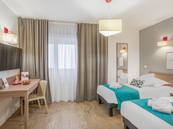 Appart'City Classic Annemasse Centre - Pays de Genève : photo 1 de la chambre studio lits jumeaux