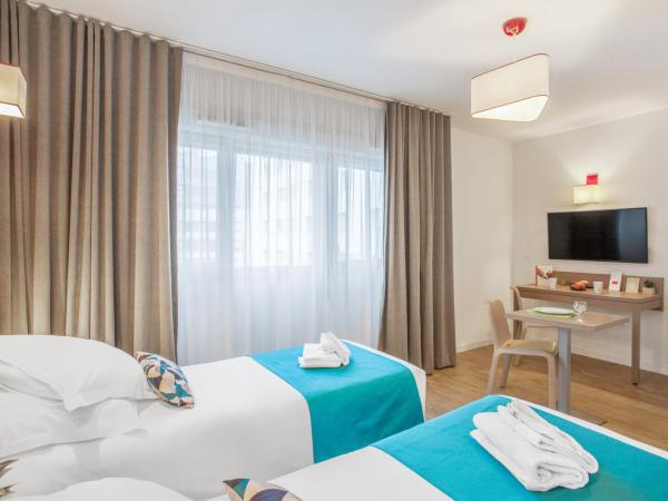 Appart'City Classic Annemasse Centre - Pays de Genève : photo 2 de la chambre studio lits jumeaux supérieur