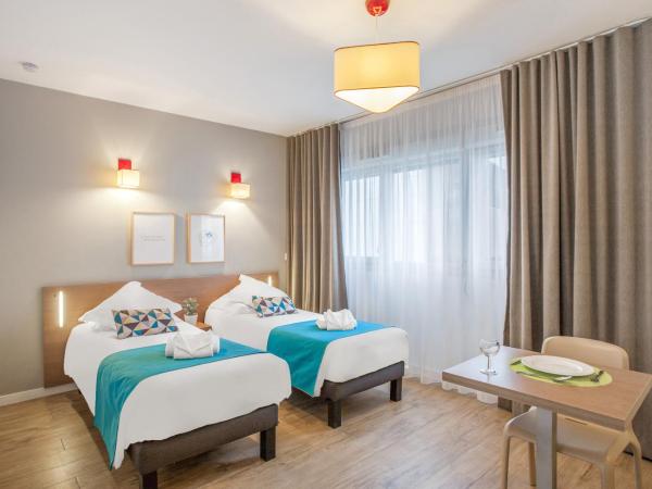 Appart'City Classic Annemasse Centre - Pays de Genève : photo 1 de la chambre studio lits jumeaux supérieur