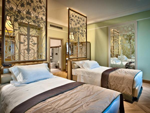 Château Monfort - Relais & Châteaux : photo 4 de la chambre chambre double ou lits jumeaux deluxe avec accès au spa