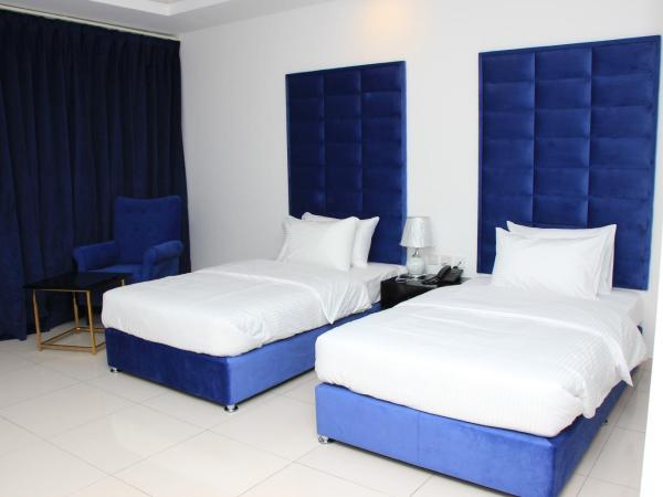 Parkside Plaza Muscat : photo 1 de la chambre chambre lits jumeaux standard