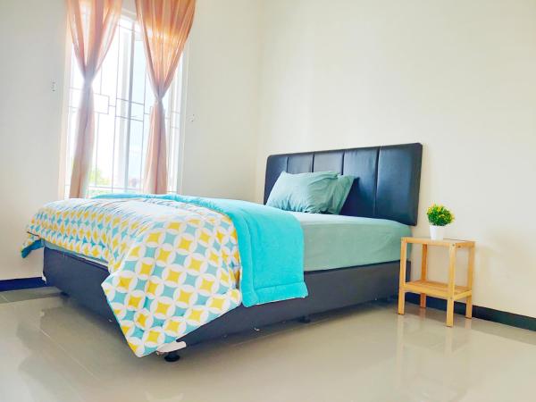 Surabaya Homey near ITS : photo 6 de la chambre chambre lit queen-size deluxe