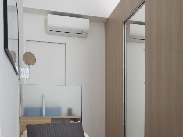 Genova Suite Art : photo 7 de la chambre petite chambre simple