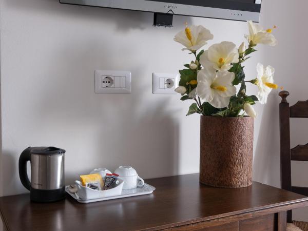 Cute & Cozy rooms train station : photo 10 de la chambre chambre quadruple avec salle de bains privative