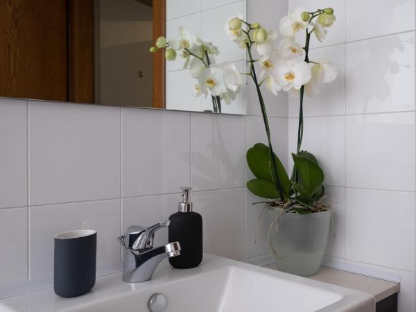 Cute & Cozy rooms train station : photo 6 de la chambre chambre quadruple