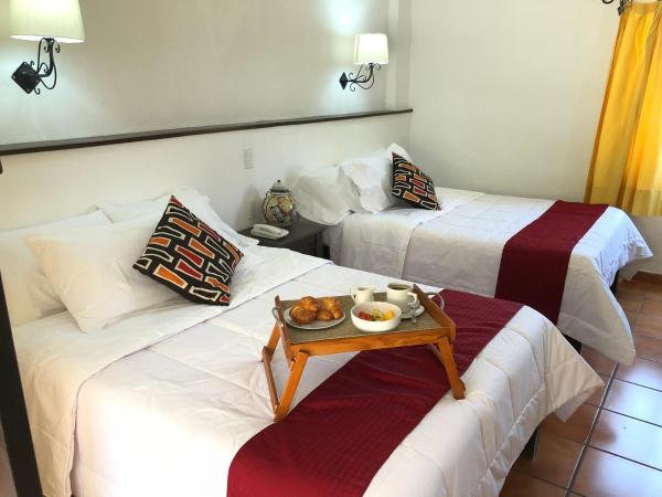 Hotel Antigua Posada : photo 1 de la chambre chambre double avec 2 lits doubles