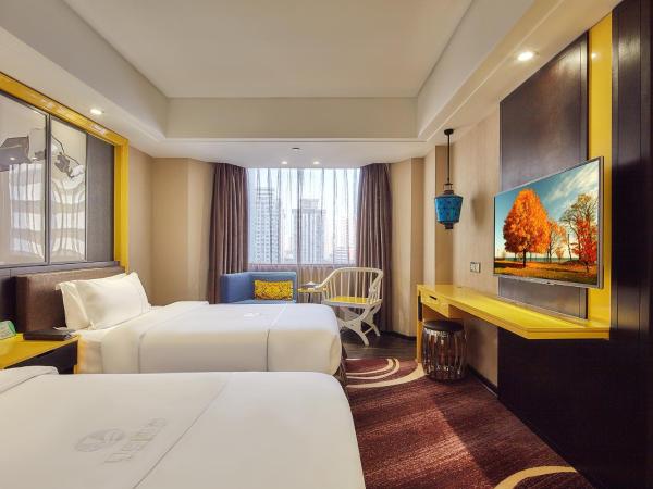 Insail Hotels ( Huanshi Road Taojin Metro Station Guangzhou) : photo 1 de la chambre chambre affaires lits jumeaux