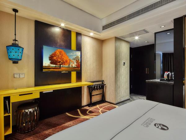 Insail Hotels ( Huanshi Road Taojin Metro Station Guangzhou) : photo 3 de la chambre chambre affaires lit queen-size