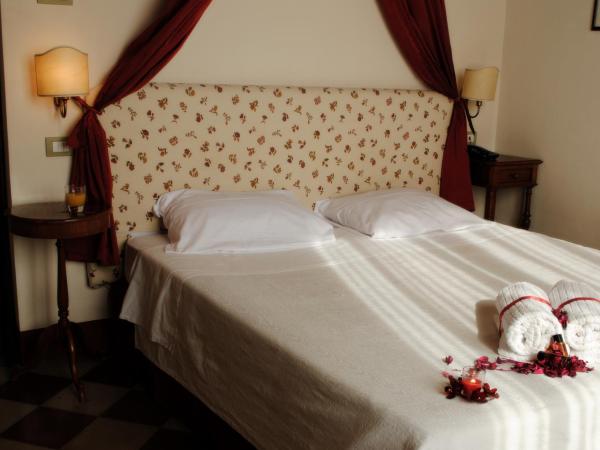 Il Chiostro Del Carmine : photo 2 de la chambre chambre quadruple deluxe