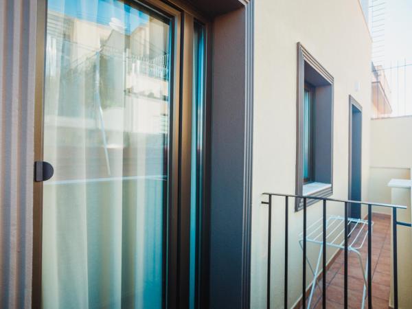 Solesperit : photo 1 de la chambre chambre triple avec balcon