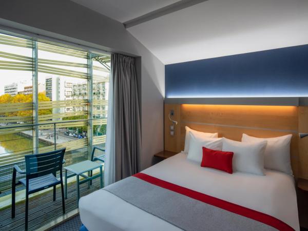 Holiday Inn Express Paris-Canal De La Villette, an IHG Hotel : photo 5 de la chambre suite de luxe - vue sur ville