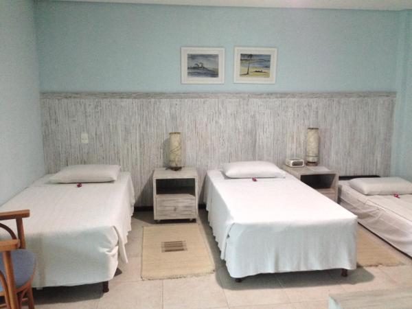 Farol de Itapuã Praia Hotel : photo 6 de la chambre chambre triple supérieure