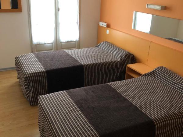 Hôtel Au Petit Languedoc : photo 1 de la chambre chambre lits jumeaux