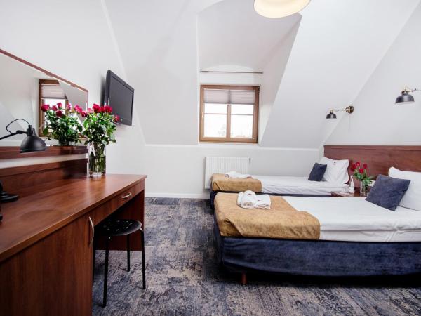 Hotel Trzy Róże : photo 2 de la chambre chambre lits jumeaux