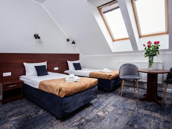 Hotel Trzy Róże : photo 3 de la chambre chambre triple