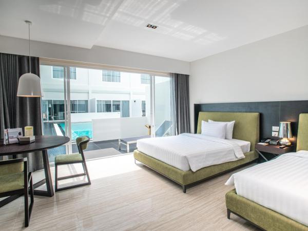S Ram Leisure Hotel SHA PLUS : photo 1 de la chambre chambre lits jumeaux avec accès à la piscine