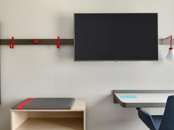 avid hotels - Orlando International Airport, an IHG Hotel : photo 6 de la chambre chambre lit king-size standard