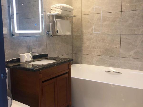 Oxley Motor Inn : photo 4 de la chambre chambre double deluxe avec baignoire