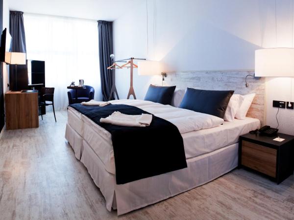 Catalonia Berlin Mitte : photo 2 de la chambre chambre lits jumeaux supérieure