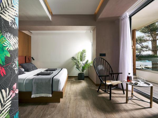 Dyo Suites : photo 7 de la chambre suite deluxe avec jacuzzi intérieur - vue sur mer