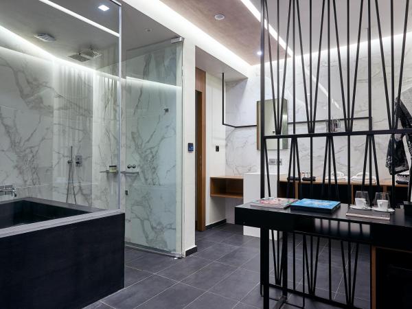 Dyo Suites : photo 10 de la chambre suite deluxe avec jacuzzi intérieur - vue sur mer