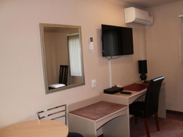 ASURE Camelot Arms Motor Lodge : photo 2 de la chambre suite deluxe exécutive