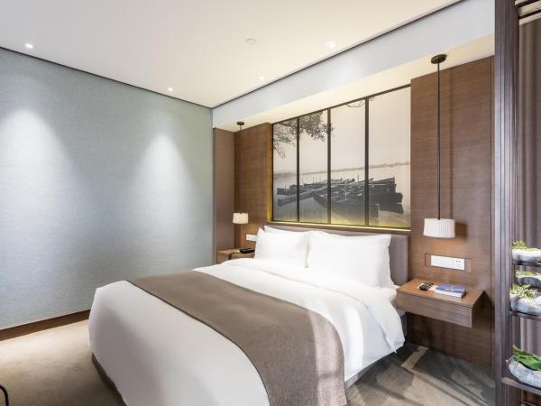 Tea Boutique Hotel West Lake : photo 1 de la chambre chambre lit king-size jardin