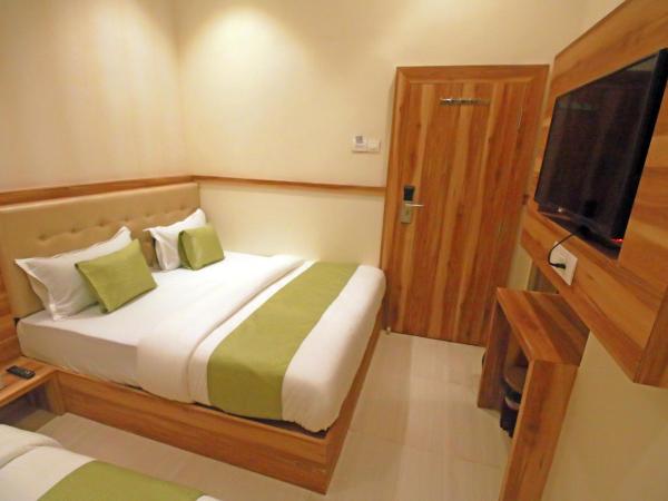Hotel Al Madina palace : photo 5 de la chambre chambre triple Économique avec salle de bains commune