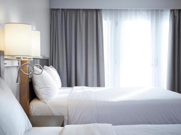 Hôtel Cofortel : photo 2 de la chambre chambre double avec 2 lits doubles - rez-de-chaussée
