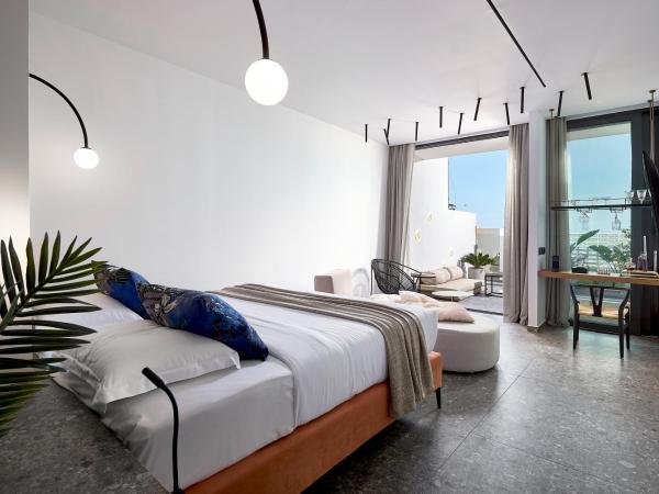 Dyo Suites : photo 1 de la chambre suite deluxe avec jacuzzi extérieur - vue sur mer