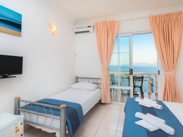 Family Beach Rooms : photo 2 de la chambre chambre triple standard - vue sur mer