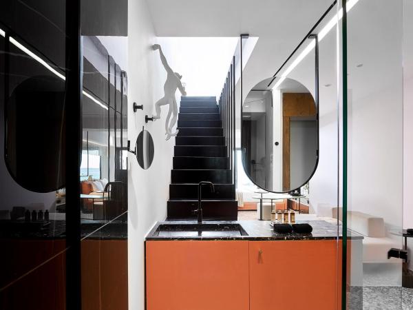 Dyo Suites : photo 9 de la chambre suite exécutive avec baignoire spa extérieure - vue sur mer