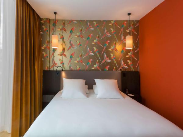 Hotel L'Arbre Voyageur - BW Premier Collection - LILLE : photo 2 de la chambre suite lit king-size avec jacuzzi