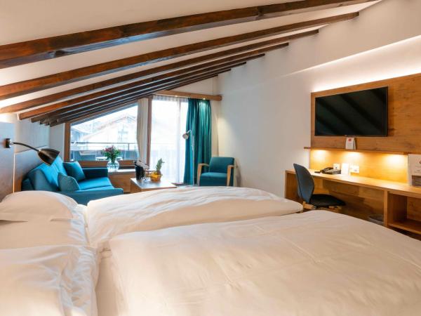Alpen Resort & Spa : photo 3 de la chambre chambre familiale avec lit d’appoint 