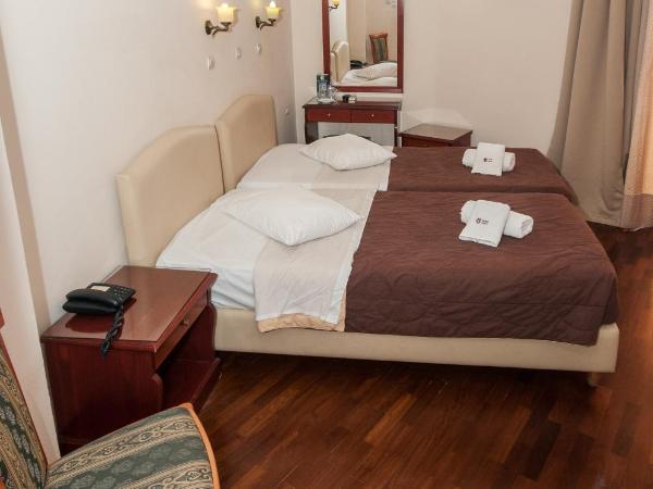 Cecil Hotel : photo 3 de la chambre chambre lits jumeaux