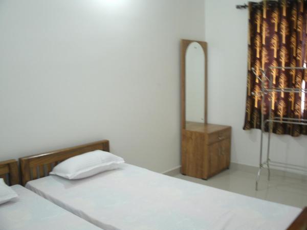 Jacaranda Holiday Home : photo 4 de la chambre appartement standard