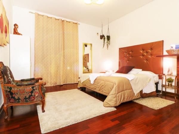 Vitti's Home Verona : photo 8 de la chambre chambre triple confort